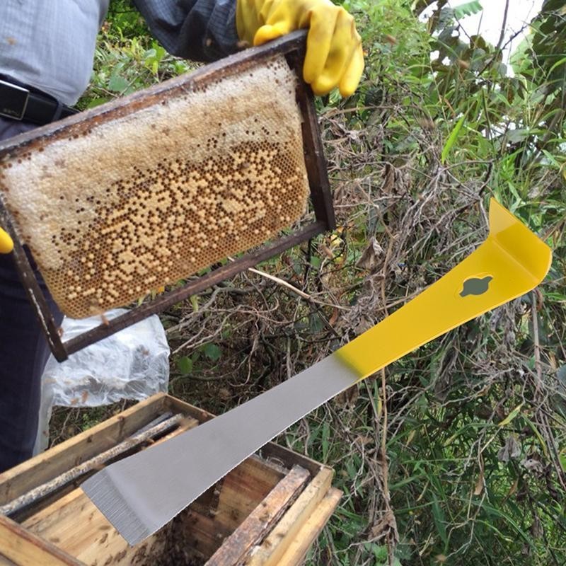 Imkerei-Multifunktionsschaber J-Form Bienenstockwerkzeuge Griff geschnittenes Honigmesser